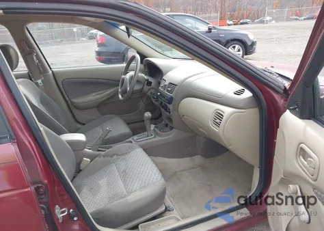 2003 Nissan Sentra Xe z USA, uszkodzony, nr VIN 3N1CB51D53L705991
